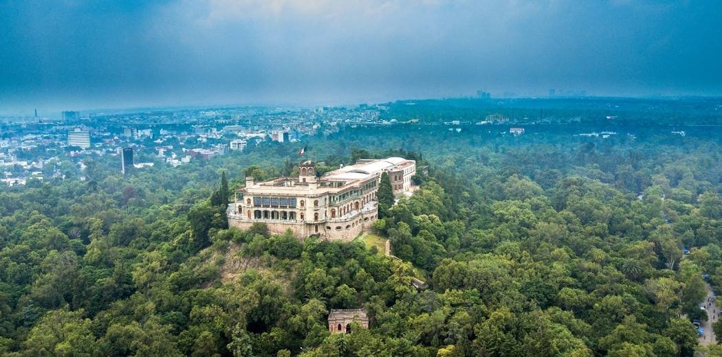 a large building on a hill